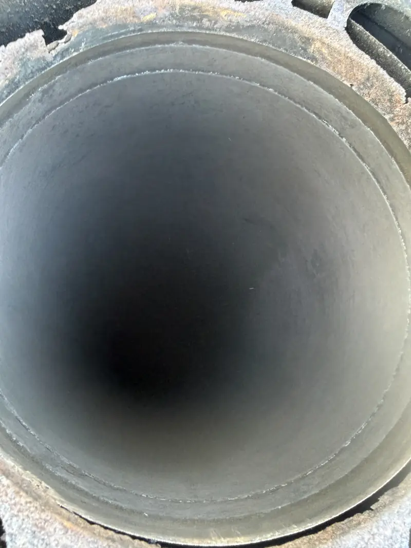 Looking up a chimney flue after sweeping, clean and clear